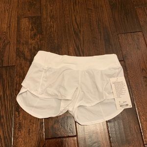 Brand new size 6 white Lululemon speed up shorts